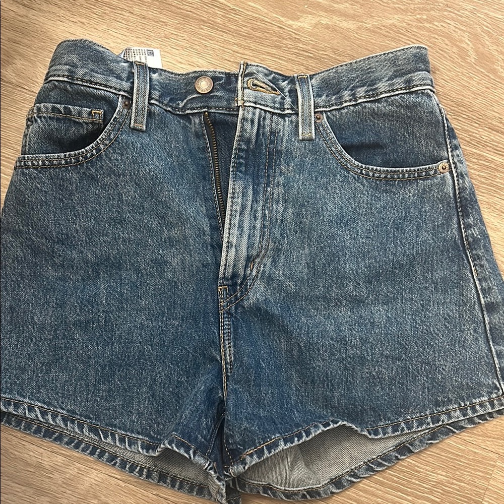 Blue Jean Shorts with Raw Hem and Vintage Style